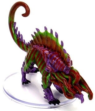 Ksarik mini figure, a four-legged creature with a spiney back, long tail, and tentacles protruding from its face