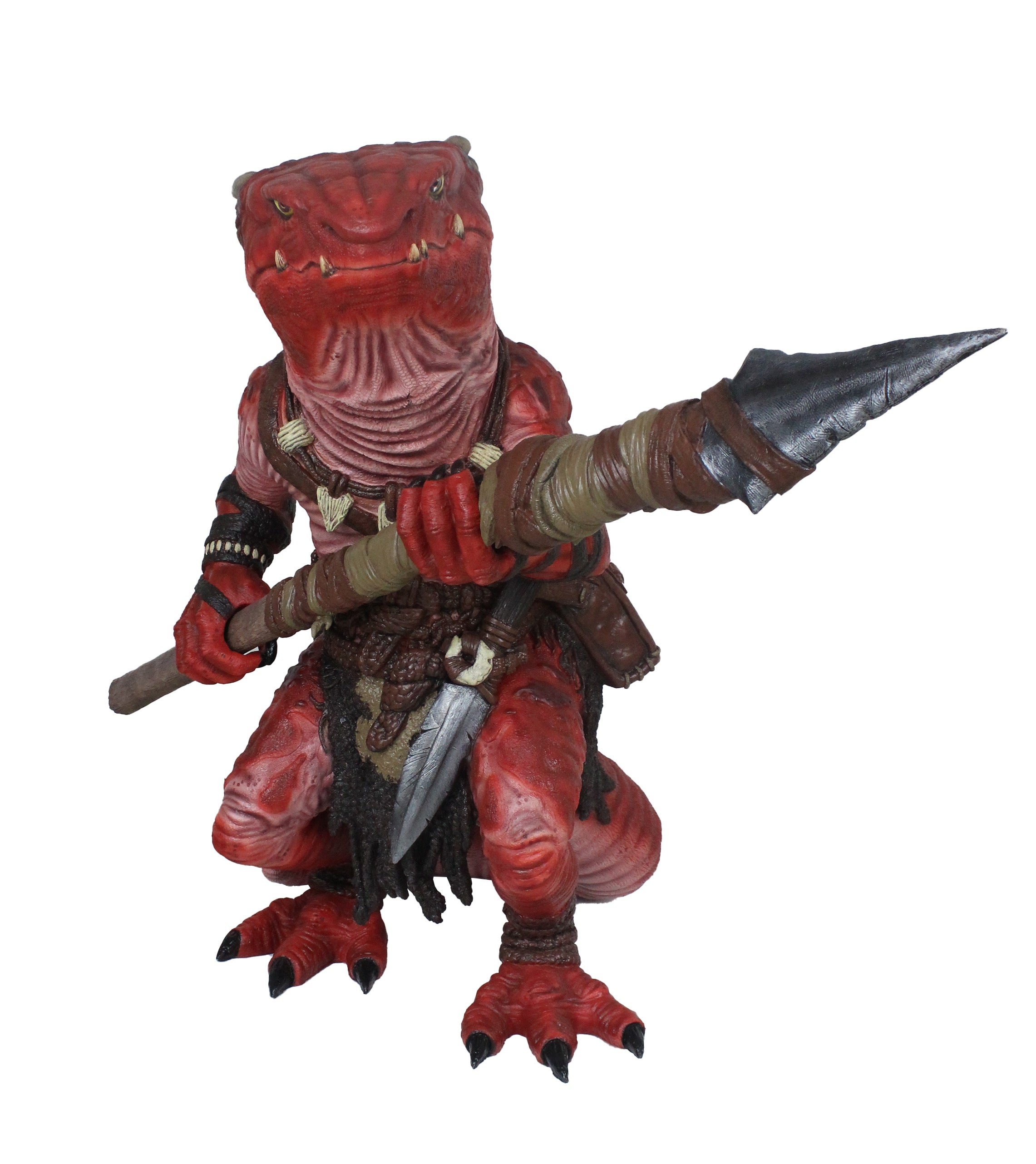 A red kobold holding a spear 
