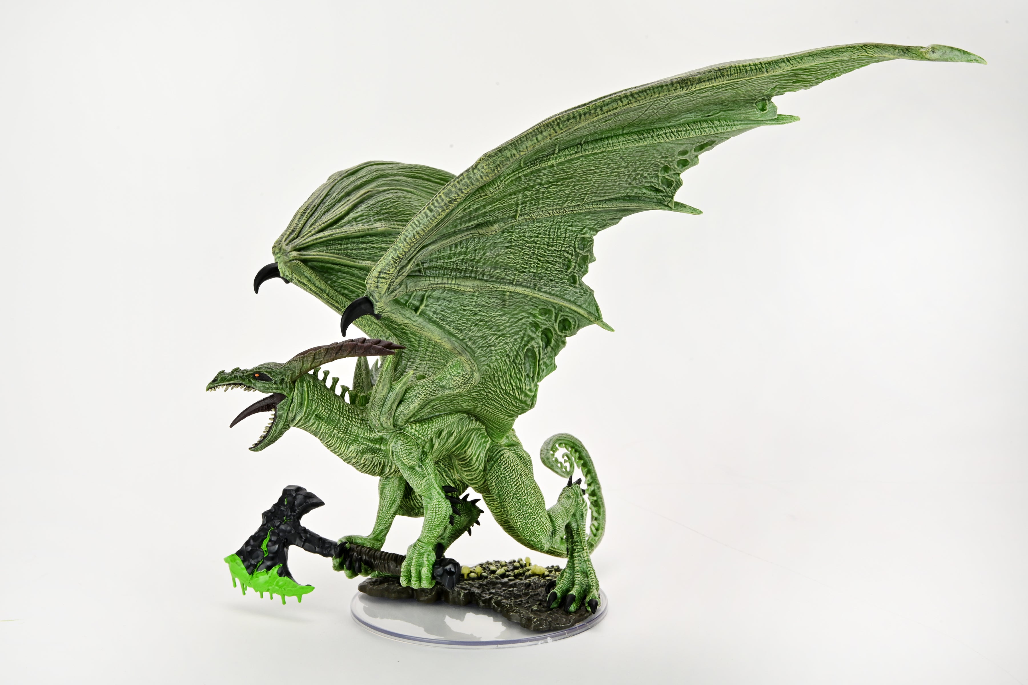 Mini figure of Tree Razer, a green dragon wielding a large axe