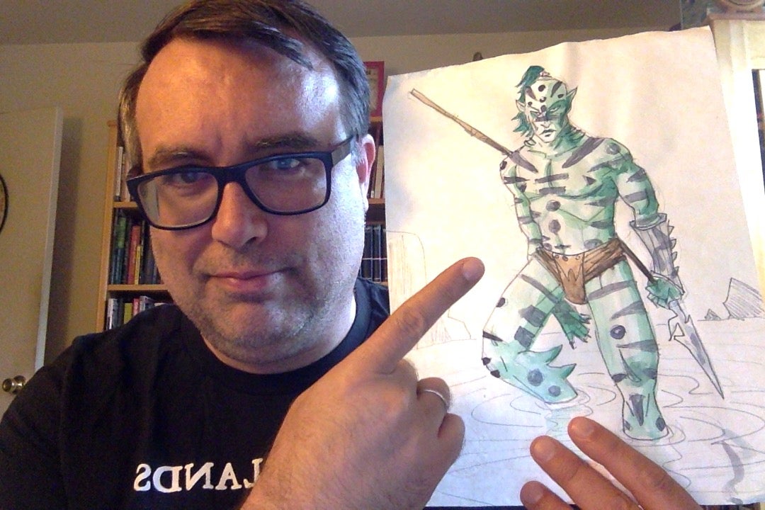 Fred Van Lente posing with an illustration of his Pathfinder Player Character