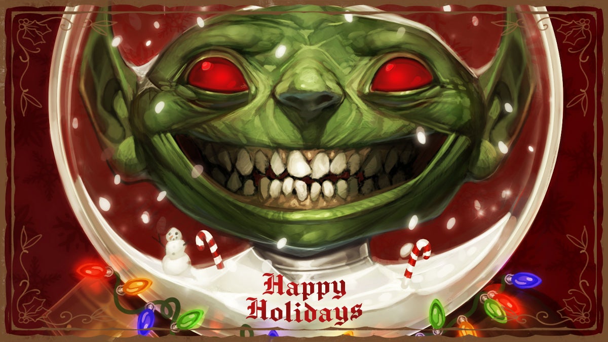 Paizo Happy Holidays card, featuring a red eyed smiling goblin with its space helmet turned into a snow globe and lights around its neck