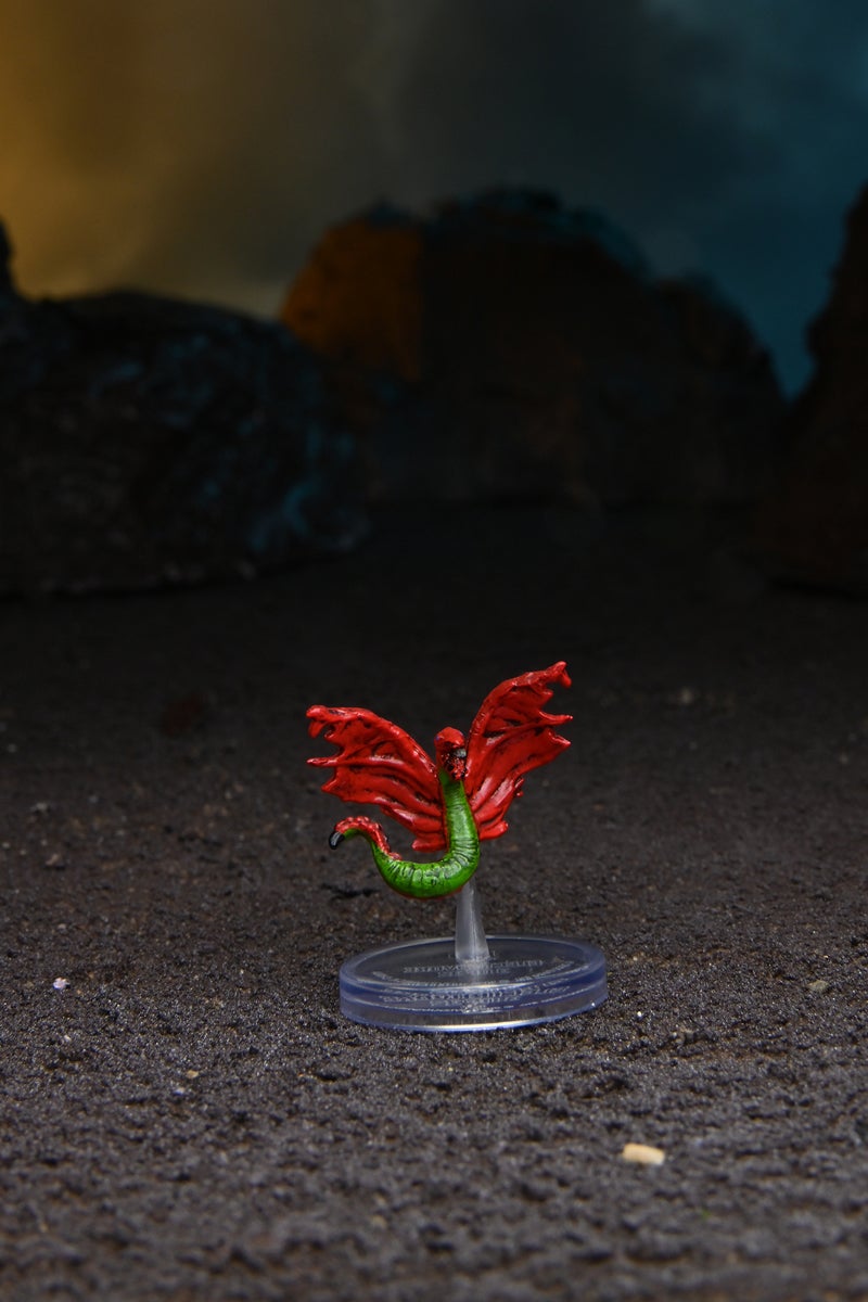 mini figure of an Electrovore, a small eel-like alien with red wings and green body