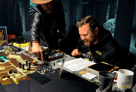 Joe from the Glass Cannon Network sitting at the table