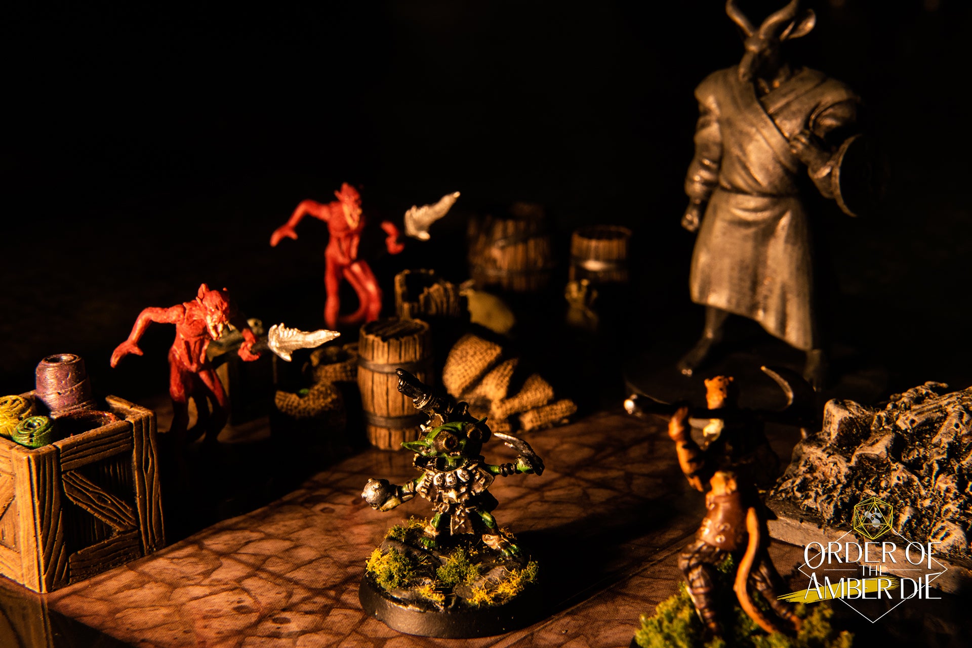 The Order of the Amber Die's mini figures in a dimly lit setting