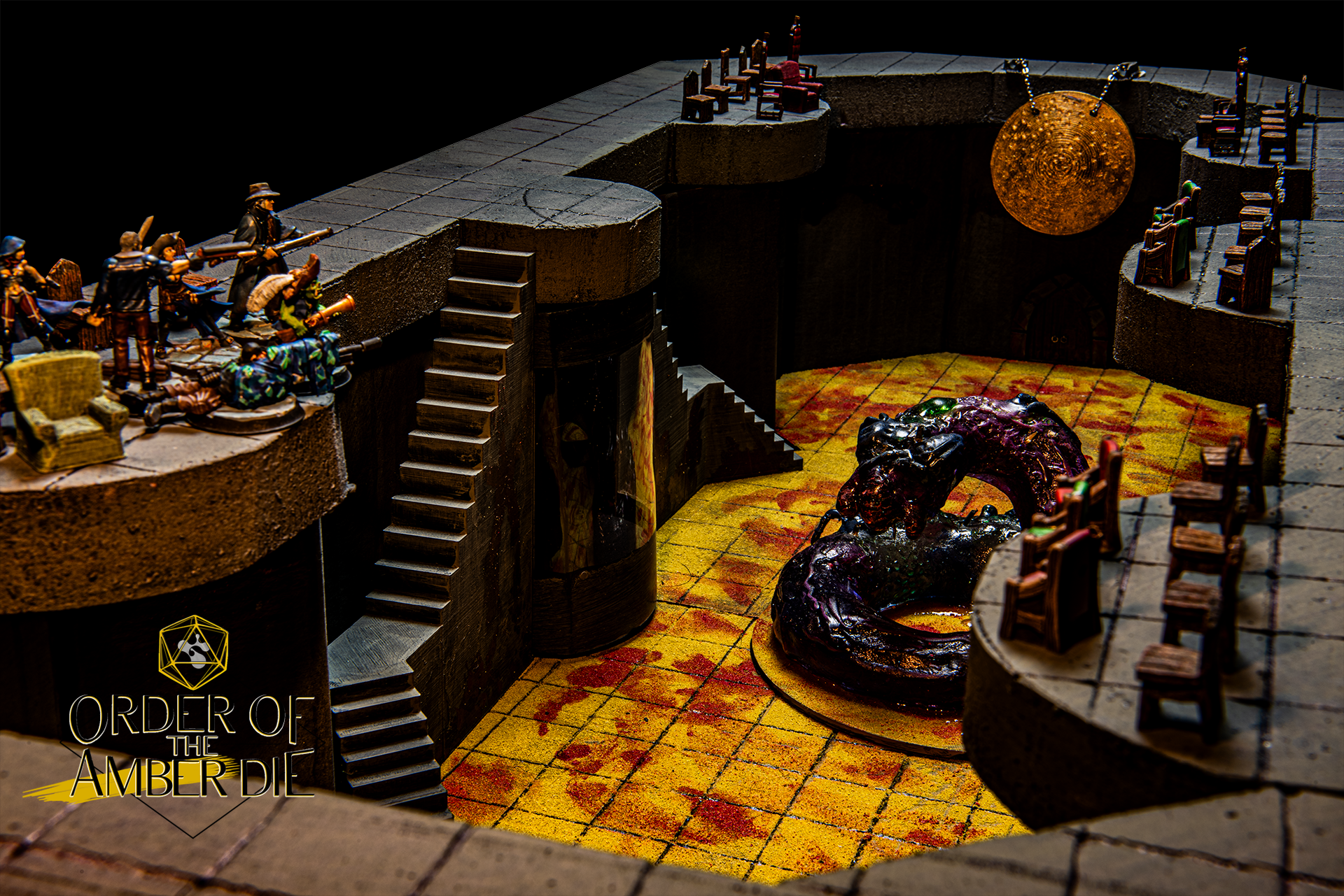 A close up view of mini figures in a dungeon standing on a ledge overlooking a monster mini