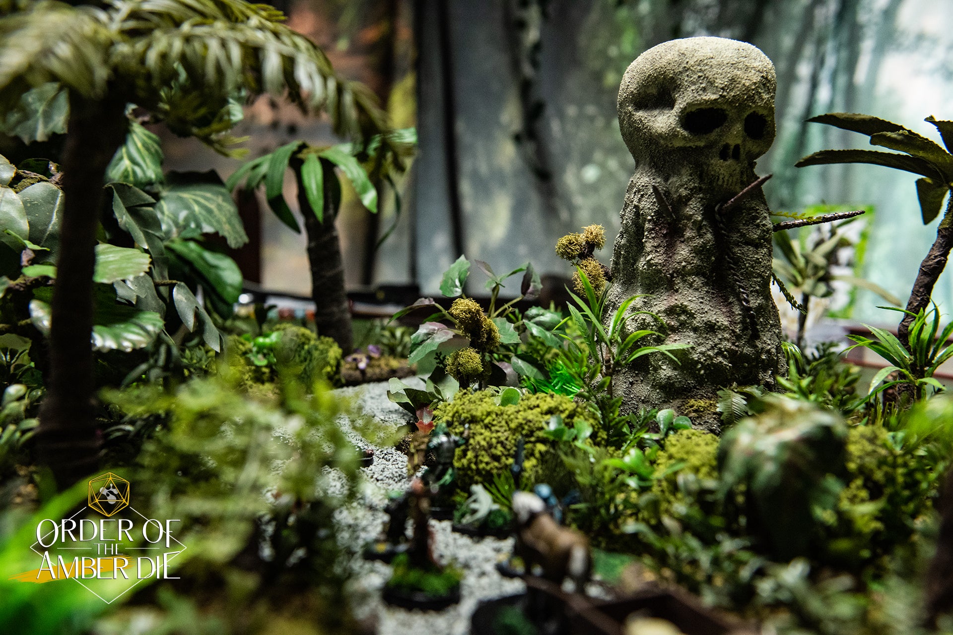 A close up view of mini figures set into a jungle setting