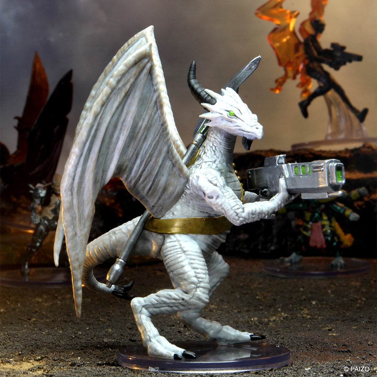 A battle scene featuring the dragonkin mini figure