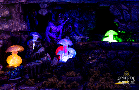 A closeup on the game space glowing under a dark light