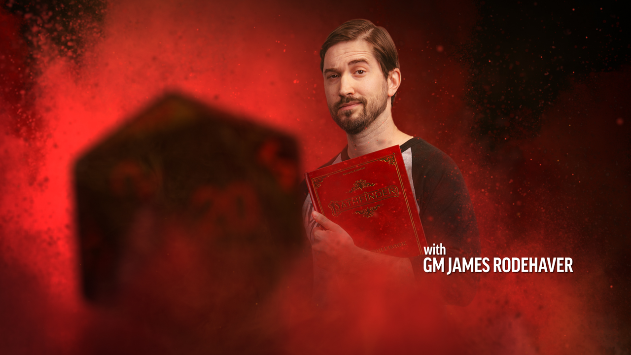 GM James Rodehaver, a man standing in a red smokey background holding a core rulebook, with a D20 dice in the foreground
