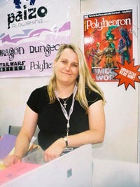 Lisa Stevens standing for a photo