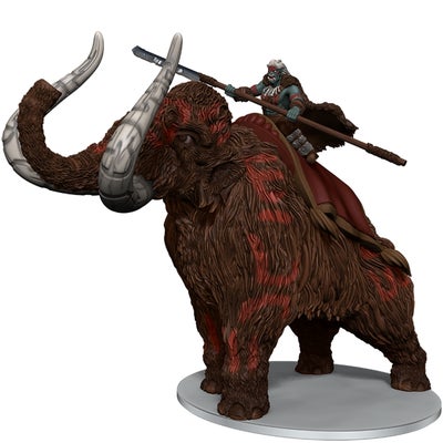 Painted miniature of an orc dressed in fur and leather armor, riding a mammoth
