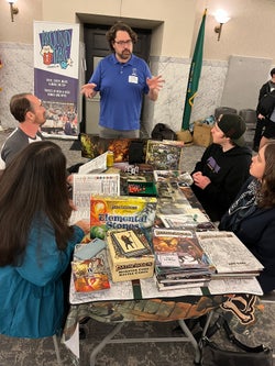 Pathfinder Lead Designer, Logan Bonner running Legislative Game Day participants through the Pathfinder Beginner Box