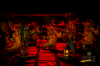 A close up of mini figures of the fleshwarp monsters