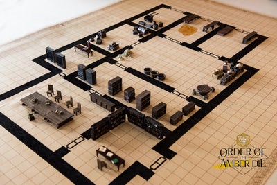 View looking down on the table map, different rooms include a dining hall, offices, and a few large storage rooms