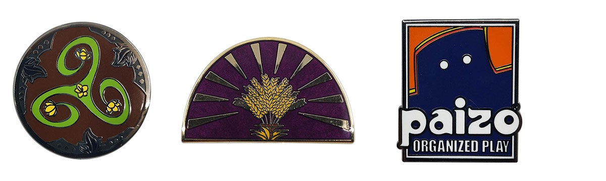 Pathfinder society pins for Verdant Wheel and Radiant Oath, as well as a Paizo Organized Play Logo pin