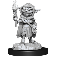 Miniature of a female goblin rogue, holding a torch in one hand and resting the other on a bag at her hip